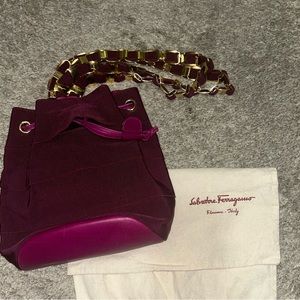 Authentic Salvatore Ferragamo mini back pack with gold hardware.